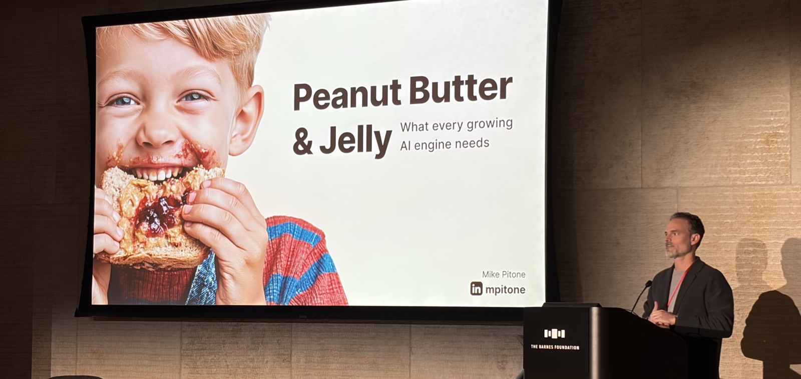 Mike Pitone presenting the title slide of The PB&J Principle: What every growing AI engine needs at the 1682 Conference, Barnes Foundation, Philadelphia